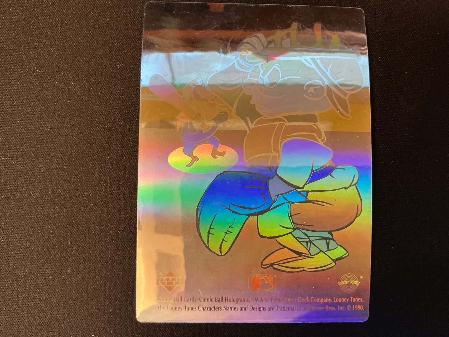 Holograma de Elmer Gruñón atrapando cómics de Upper Deck de 1990