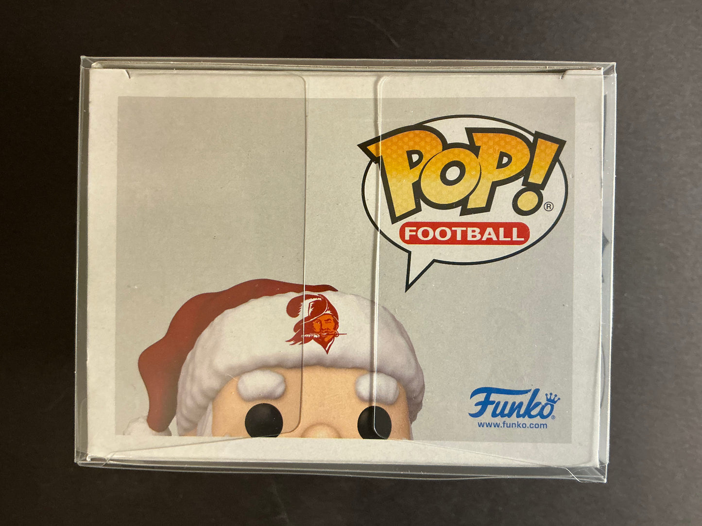 Tampa Bay Buccaneers Santa Claus # 273 Funko Pop! in a Semi-Rigid Protective Case from UltraPro