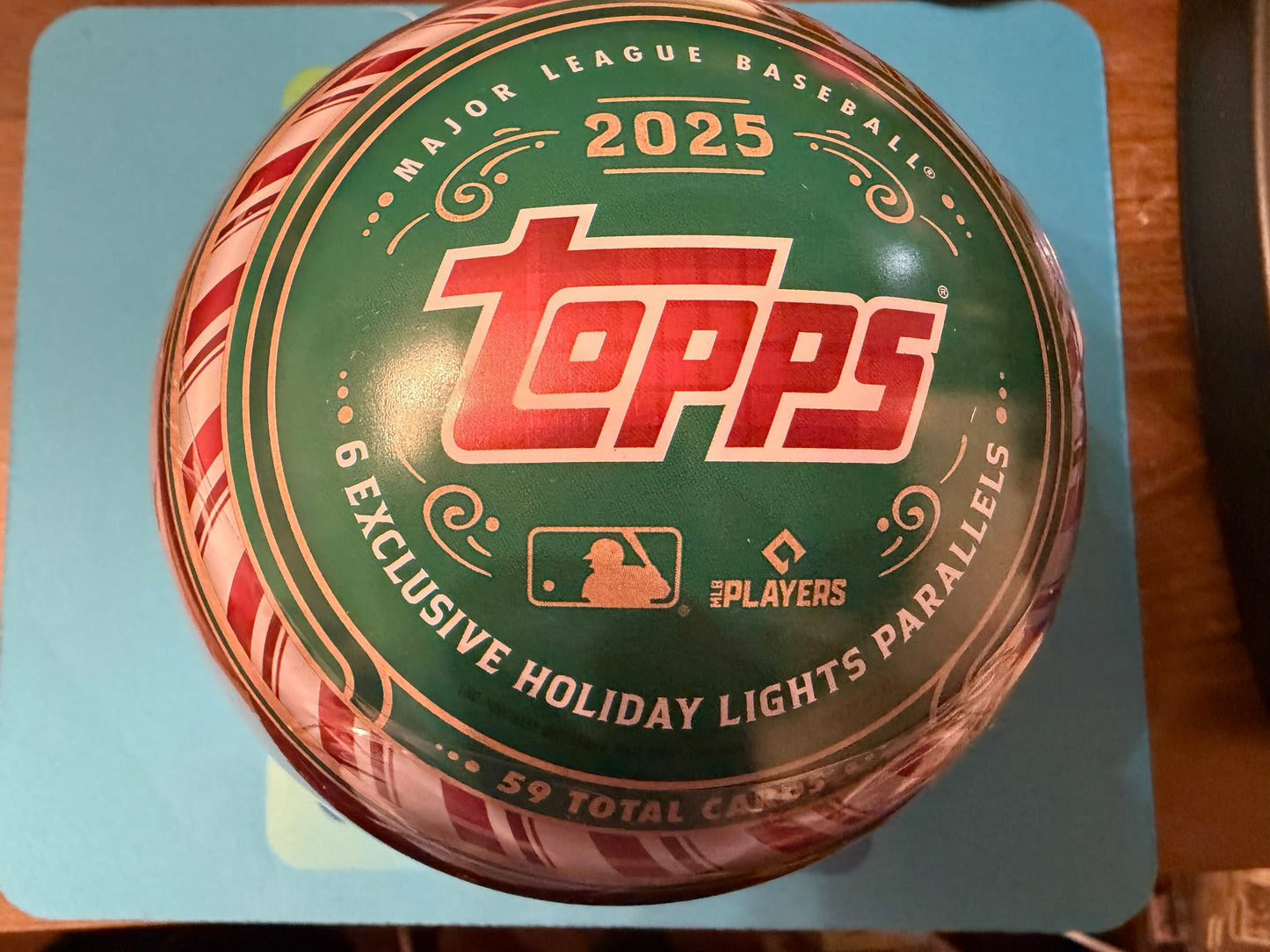 Topps 2025 holiday lights packaging on a blue background