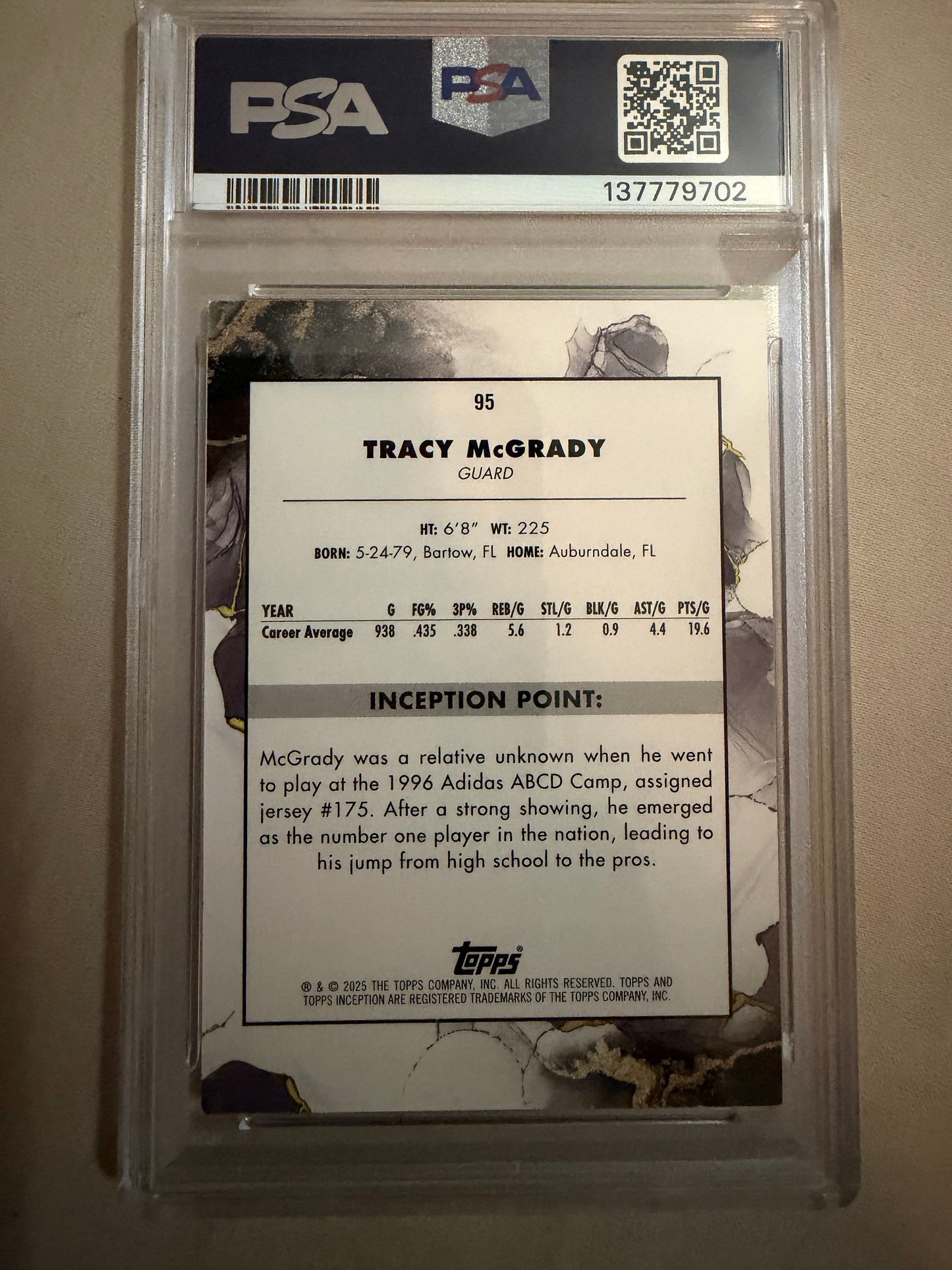 Tracy McGrady trading card in a PSA protective case with a white background
