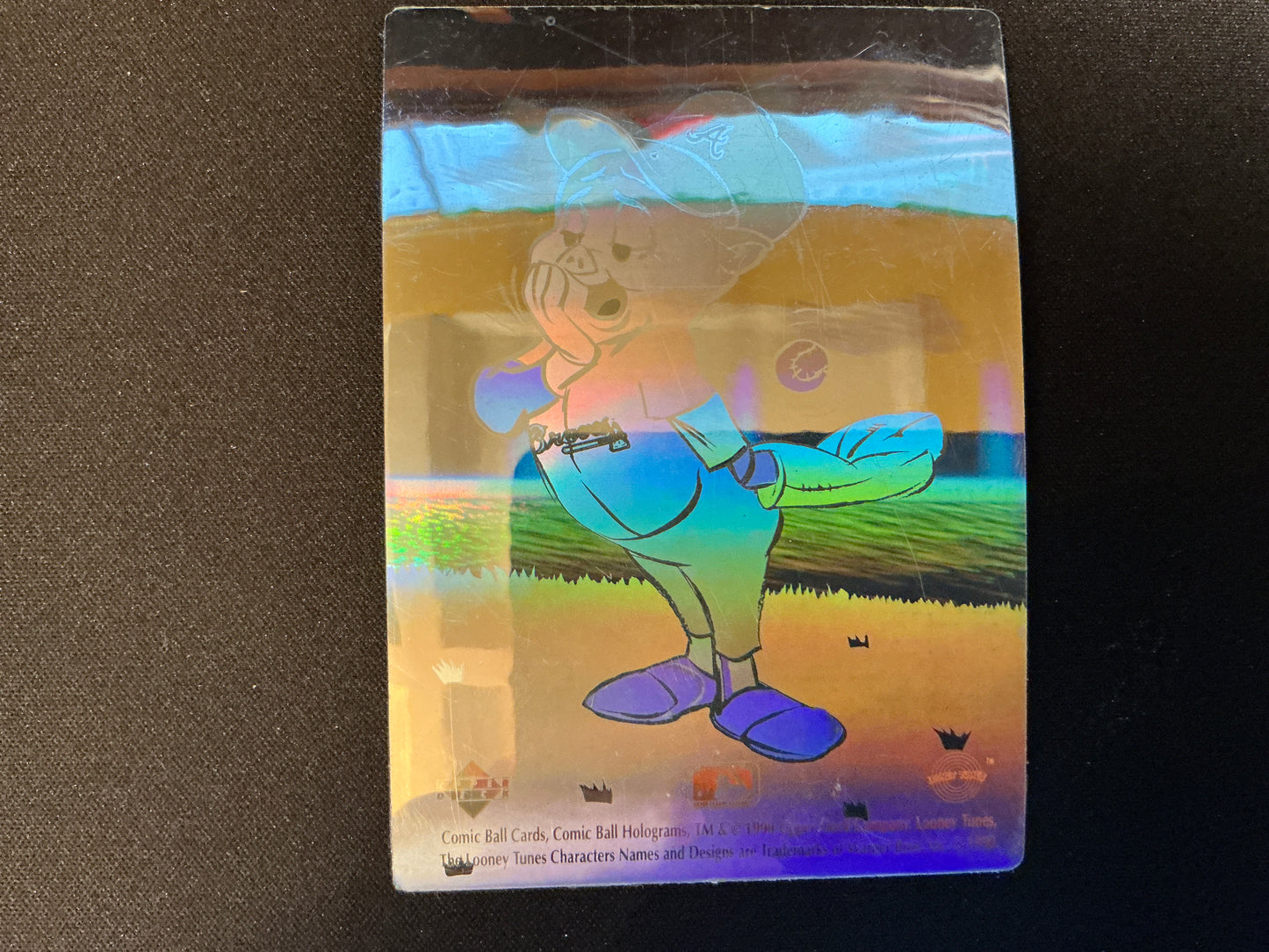 Bola cómica de Upper Deck de 1990: Elmer Fudd lanzando un holograma de los Bravos de Atlanta