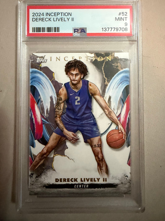 Basketball trading card of Dereck Lively II in a protective case with a beige background