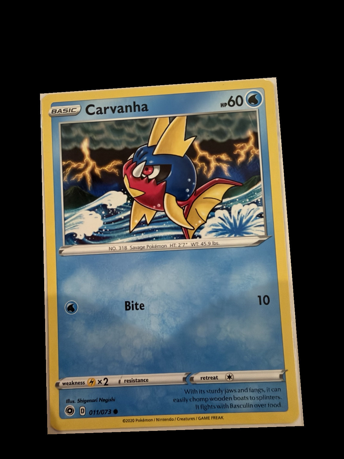 Carvanha 011/073 front — actual card